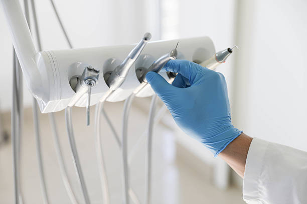 Professional Tooth Extraction technician working in Shelburn, IN